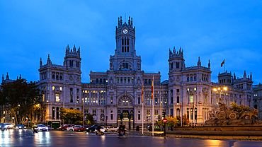 Scenic view of Plaza de Cibeles, featuring the majestic Cibeles Palace in the background and the famous Cibeles Fountain in the foreground, Madrid, Spain, Europe