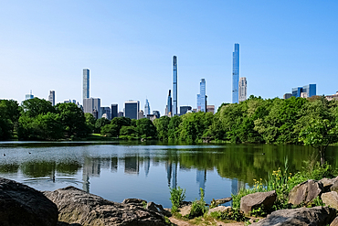 New York City cityscape viewed from The Lake, Central Park's largest body of water after the Reservoir, Central Park, Manhattan, New York City, United States of America, North America