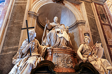 Detail of the funerary monument to Pope Innocent XI, by the French sculptor Pierre-Etienne Monnot, housed within St. Peter's Basilica in Vatican City, the papal enclave in Rome, UNESCO World Heritage Site, Rome, Lazio, Italy, Europe