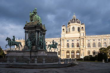 Vienna, Austria – View of the Empress Maria Theresia monument with the Natural History Museum's grand Renaissance Revival facade in the background, creating a majestic historical ensemble at Maria-Theresien-Platz.