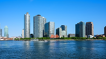 The Pepsi-Cola sign, built in 1940, a neon sign at Gantry Plaza State Park in the Long Island City neighborhood of Queens, visible fromManhattan the East East River, New York City, United States of America, North America