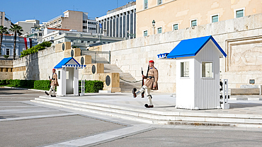 Athens, Greece – View of the Greek Presidential Guard (Evzones) in traditional uniform outside the Presidential Mansion, showcasing their ceremonial dress and disciplined stance.