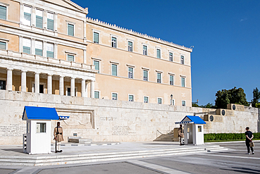 Athens, Greece – View of the Greek Presidential Guard (Evzones) in traditional uniform outside the Presidential Mansion, showcasing their ceremonial dress and disciplined stance.