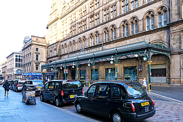 Glasgow, Scotland – Exterior of the iconic Central Station, a monumental Victorian railway terminus with a vast, impressive facade and grand archways.
