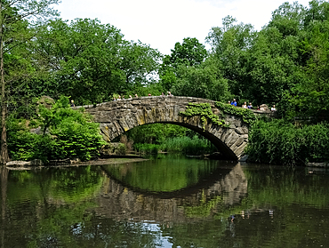 View of The Pond, one of seven bodies of water in Central Park located near Grand Army Plaza, across Central Park South from the Plaza Hotel, New York City, United States of America, North America