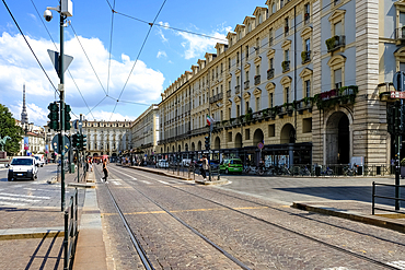 View of the streets surrounding Piazza Castello, a prominent city square in the city center, housing several city landmarks, museums, theaters, and cafes, Turin, Piedmont, Italy, Europe