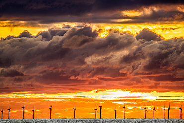 Sunset view from Walney Island across the Irish Dea towards the distant Walney Offshore Wind Farm, Cumbrian Coast, Cumbria, England, United Kingdom, Europe