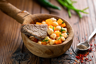 Central Asian food, Nohatshurak soup with chickpeas, vegetables and spices, Uzbek and Central Asian cuisine concept, side view, Tashkent, Uzbekistan, Central Asia Asia