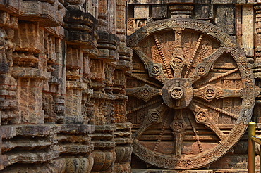 Konark 13th-century Sun Temple (Surya Deula) designed to represent chariot of Hindu Sun God with 12 huge carved stone wheels and 7 stone horses around its base UNESCO World heritage site.Images of stone chariot wheels.