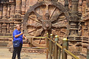 Konark 13th-century Sun Temple (Surya Deula) designed to represent chariot of Hindu Sun God with 12 huge carved stone wheels and 7 stone horses around its base UNESCO World heritage site.Images of stone chariot wheels.