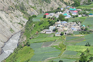 Scenic view of a village in Lahaul valley near Udaipur on the Bank of River Chander Bhaga, Himachal Pradesh, India, Asia