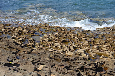 Porous sand stone rocks on Jalandhar Beach near the south pole point in Diu, India, Asia