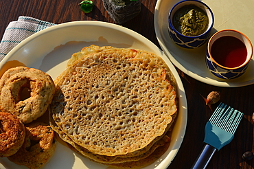 Rice flour cheela a savory Indian pancake made from a smooth batter of rice flour.