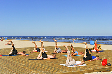 Stretching class on a beach of Jurmala, Gulf of Riga, Latvia, Baltic region, Europe