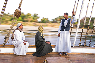 Members of the crew on board a dahabeah, passenger river boat of the Lazuli fleet, sailing on the Nile river, Egypt, North Africa, Africa