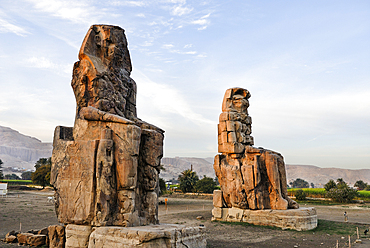 Colossi of Memmon, massive stone statues of Pharaoh Amenhotep III in the Theban necropolis, Luxor, Egypt, Africa