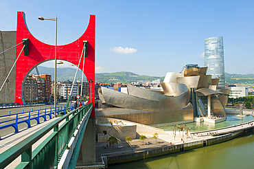 L'Arc Rouge (The Red Arch) by the French artist Daniel Buren on La Salve Bridge (The Prince and Princess of Spain Bridge) in front of the Guggenheim Museum designed by architect Frank Gehry, Bilbao, province of Biscay, Basque Country, Spain, Europe