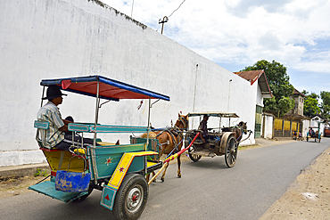 'Dokar' riding, horse-drawn cart, a typical Indonesian means of transport, Lasem, Java island, Indonesia, Southeast Asia