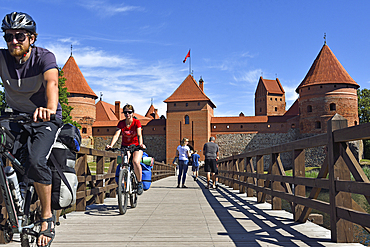 Wooden bridge leading to the Trakai Castle on an island in Lake Galve, Lithuania, Europe