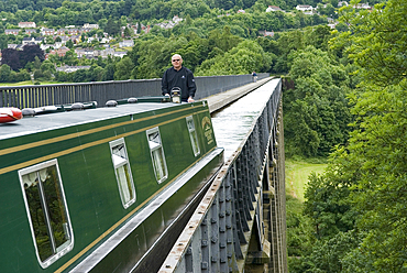 Narrow boat on Pontcysyllte Aqueduct, UNESCO, Llangollen Canal over valley of the River Dee, Wales, United Kingdom