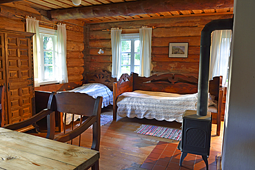 Interior of a log house, Miskiniskes rural accommodations, Aukstaitija National Park, Lithuania, Europe