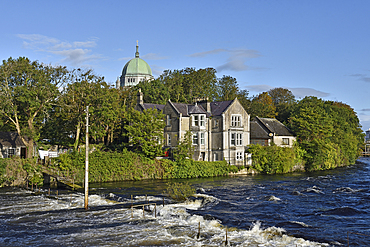 Corrib River with the dome of the Cathedral in the background, Galway, Connemara, County Galway, Connacht, Republic of Ireland