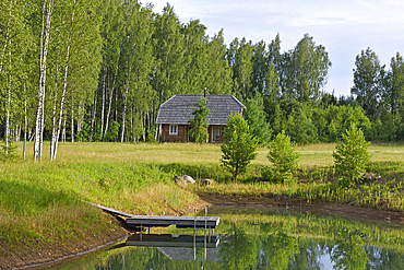 Small lake on the homestead, Miskiniskes rural accommodations, Aukstaitija National Park, Lithuania, Europe