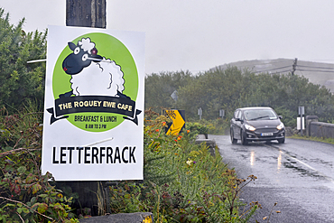 Country road under rain near Clifden, Connemara, County Galway, Connacht, Republic of Ireland