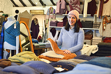 Caitriona Conneely in her Cottage Handcrafts shop, selling Irish knitwear, Moyard, Connemara, County Galway, Connacht, Republic of Ireland