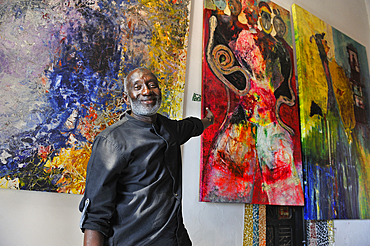 Senegalese artist painter Abdoulaye Diallo in his house and workshop, Ngor island, Dakar,Senegal, West Africa