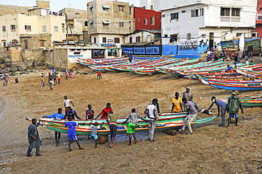 Fishing dugout boats on beach, Ngor village, Pointe des Almadies, Dakar, Senegal, West Africa