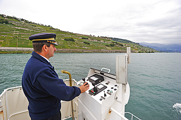 Captain of the Belle Epoque paddle steamer La Suisse on Lake Leman, Lausanne, Canton of Vaud, Switzerland