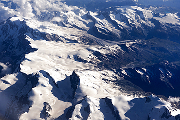 Summits of Alps viewed from an airplane over Europe