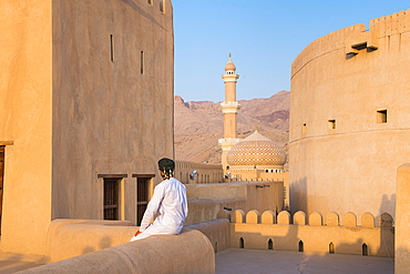 Abdullah, guide of the Museum, posing at Nizwa Fort, Ad Dakhiliyah Region, Sultanate of Oman, Arabian Peninsula