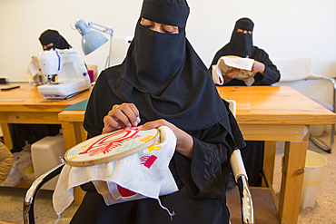 Madrasat Adeera, originaly a Girl's School, now an artistic space where women learn and practice different crafts, here a sewing and embroidery workshop, whose creations will be sold in the old town of AlUla, Medina Province, Saudi Arabia, Middle East