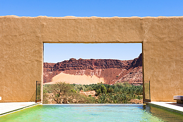 Swimming pool of Dar Tantora The House Hotel, a renovated original mudbrick village in the oasis of AlUla, Medina Province, Saudi Arabia, Middle East