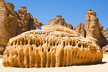 'Elyseria' by the artist Lita Albuquerque sitting on a remarkable sandstone rock , as part of the 2020 Desert X AlUla exhibition, which took place in the Ashar Valley, Medina Province, Saudi Arabia, Middle East, Medina Province, Saudi Arabia, Middle East