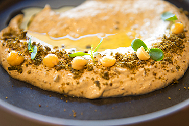 Dish (Olive Hummus) served at Harrat restaurant of Banyan Tree AlUla, Medina Province, Saudi Arabia, Middle East