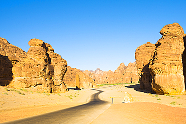 Road trough the sandstone rock formations in the desert canyons of the Ashar Valley, Medina Province, Saudi Arabia, Middle East