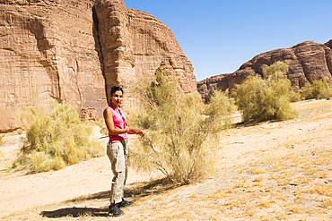 Mrs.Rana El Zein (Deputy Director Environment, Ecology and Biodiversity,French Agency for ALULA development(AFALULA) explaining to journalists about White saxaul (Haloxylon persicum), Sharaan Nature Reserve, AlUla, Medina Province, Saudi Arabia