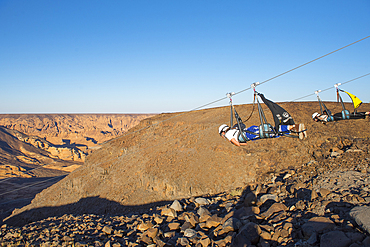 AlUla Zipline, starting from Harrat volcanic plateau, racing 1,5km at up to 120km/h speed, enjoying the incredible scenery of the Mountains, Medina Province, Saudi Arabia, Middle East