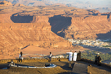 People at the Viewpoint on the Harrat volcanic plateau, AlUla, Medina Province, Saudi Arabia, Middle East