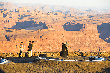 People at the Viewpoint on the Harrat volcanic plateau, AlUla, Medina Province, Saudi Arabia, Middle East