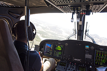 View of the interior of the cockpit of a helicopter flying over AlUla, Medina Province, Saudi Arabia, Middle East