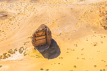 Aerial view of Qasr al-Farīd, the largest tomb within the UNESCO World Heritage Site of Hegra, also known as Mada'in Salih, in the area of AlUla, Medina Province, Saudi Arabia, Middle East