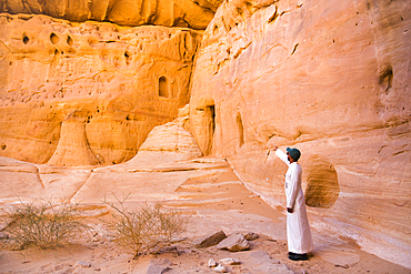 Guide in the sacred part of  Jabal Ithlib area within the Site of Hegra (Madain Salih), UNESCO, AlUla, Medina Province, Saudi Arabia