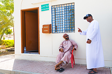 Watch man and ticket office at Bimmah Sinkhole (doline), near Tiwi, Sultanate of Oman, Arabian Peninsula, Middle East