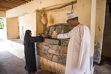 Fountain in the palm grove of the village of Misfat (or Misfah) Al Abriyeen in Jebel Akhdar, Sultanate of Oman, Arabian Peninsula, Middle East