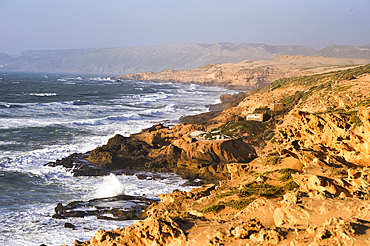 Fishermen's huts perched upon cliffs around Tamri on Atlantic Coast, between Agadir and Essaouira,Morocco,North Africa