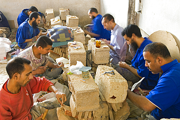 Workshop of cutting tiles for zelliges, Pottery district, Fes,Morocco,North Africa